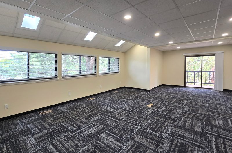 6-desk suite with skylights and a wall of windows at ZipDesk Coworking