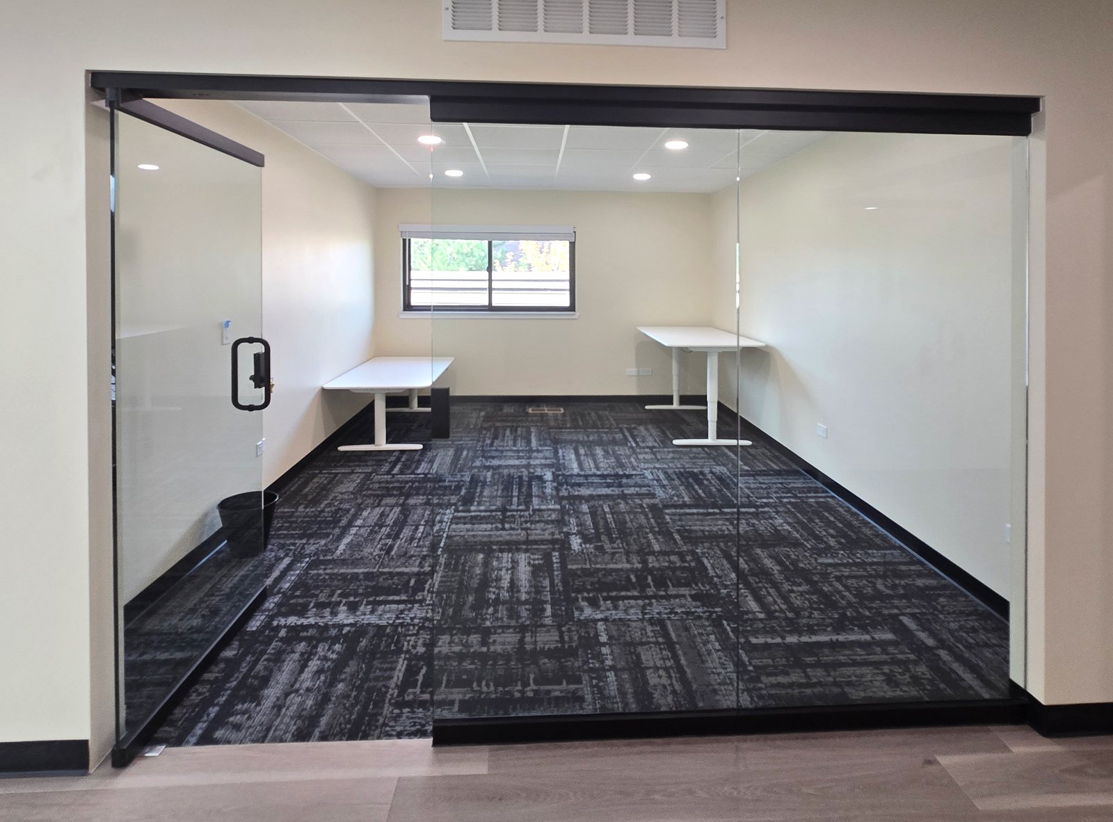 Glass-front private office with natural light at ZipDesk Coworking Building 5